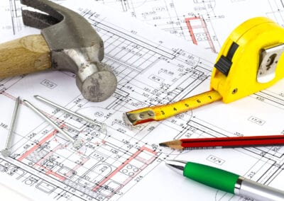 Renovation plan of the apartment with hammer and nails